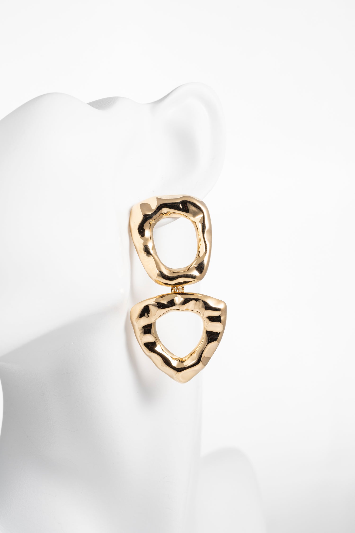 Orecchini dorati scultorei a doppia forma Flux