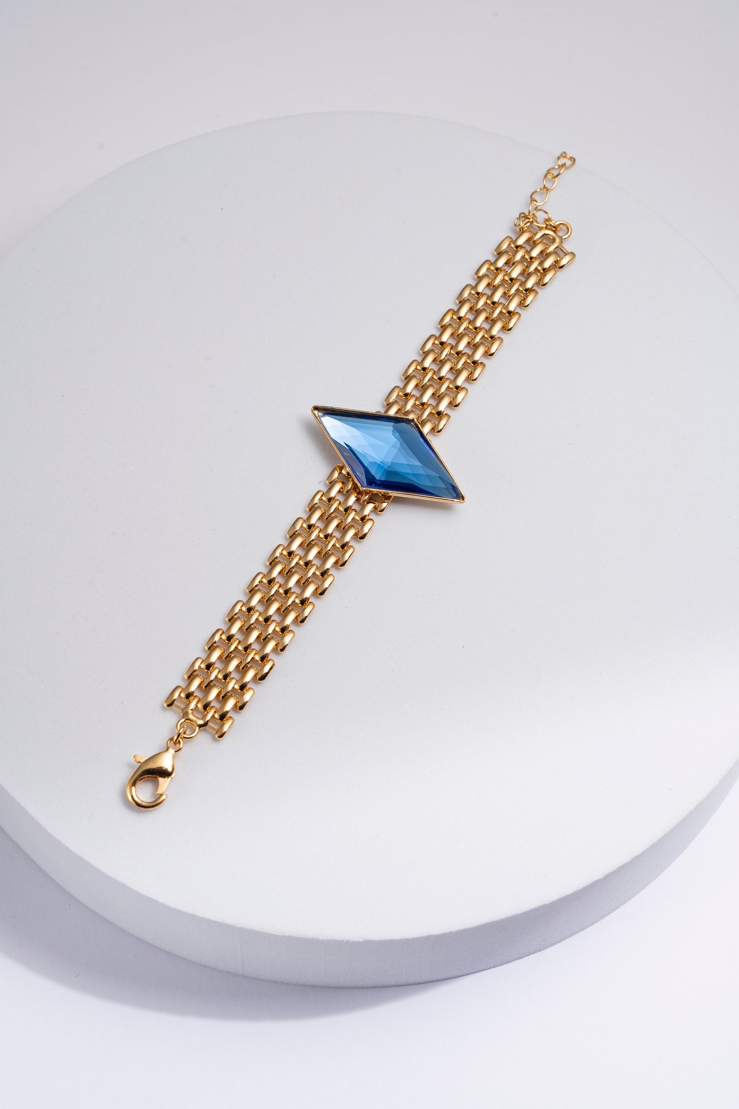 Bracciale dorato con cristallo blu taglio rombo Blue Diamond