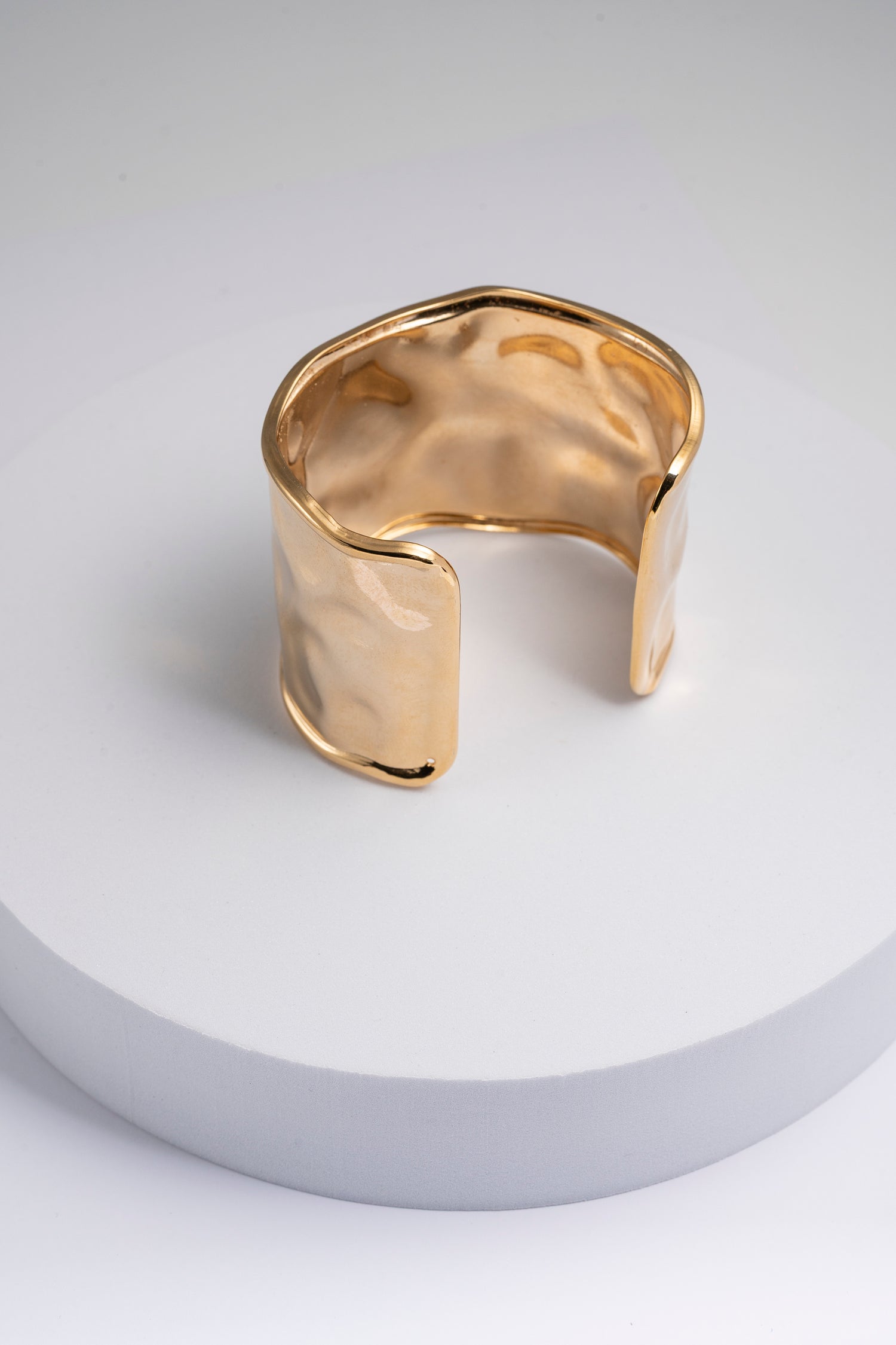 Bracciale dorato rigido regolabile effetto onda Thalassa