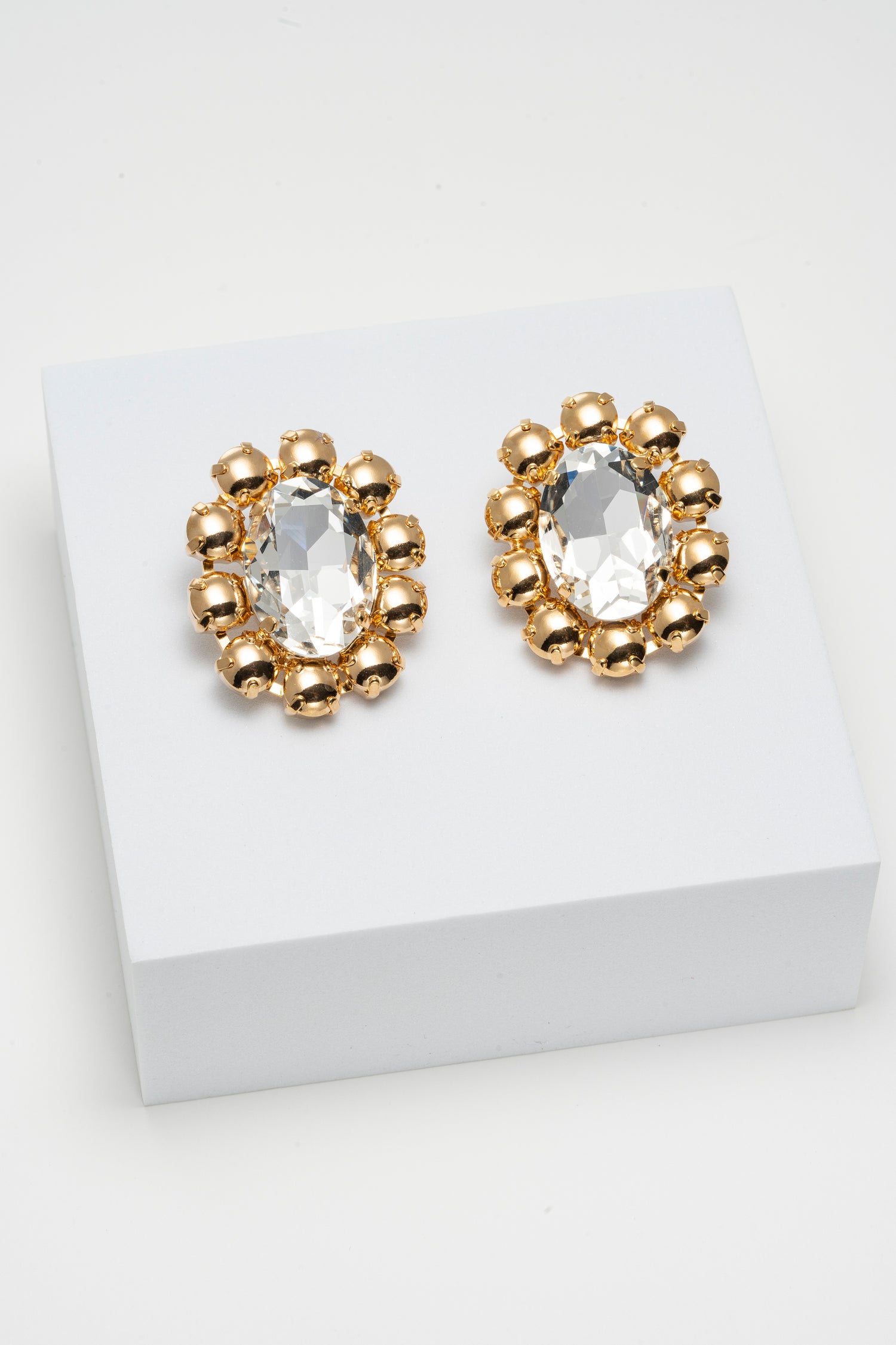 Orecchini ovali dorati con cristallo trasparente centrale Sole Barocco