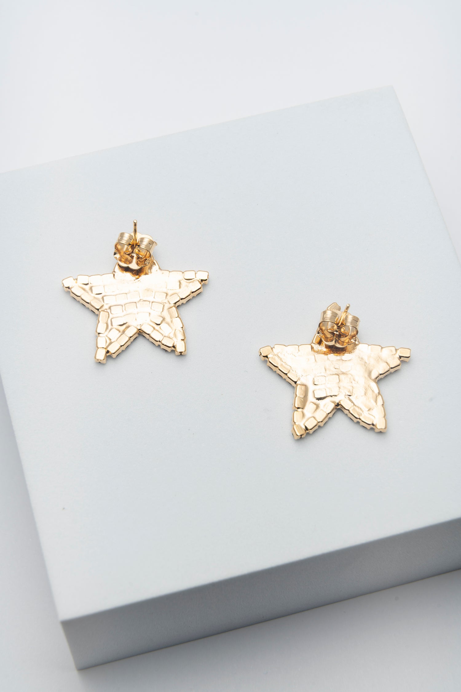 Orecchini Stella di Luce in Cristalli Dorati