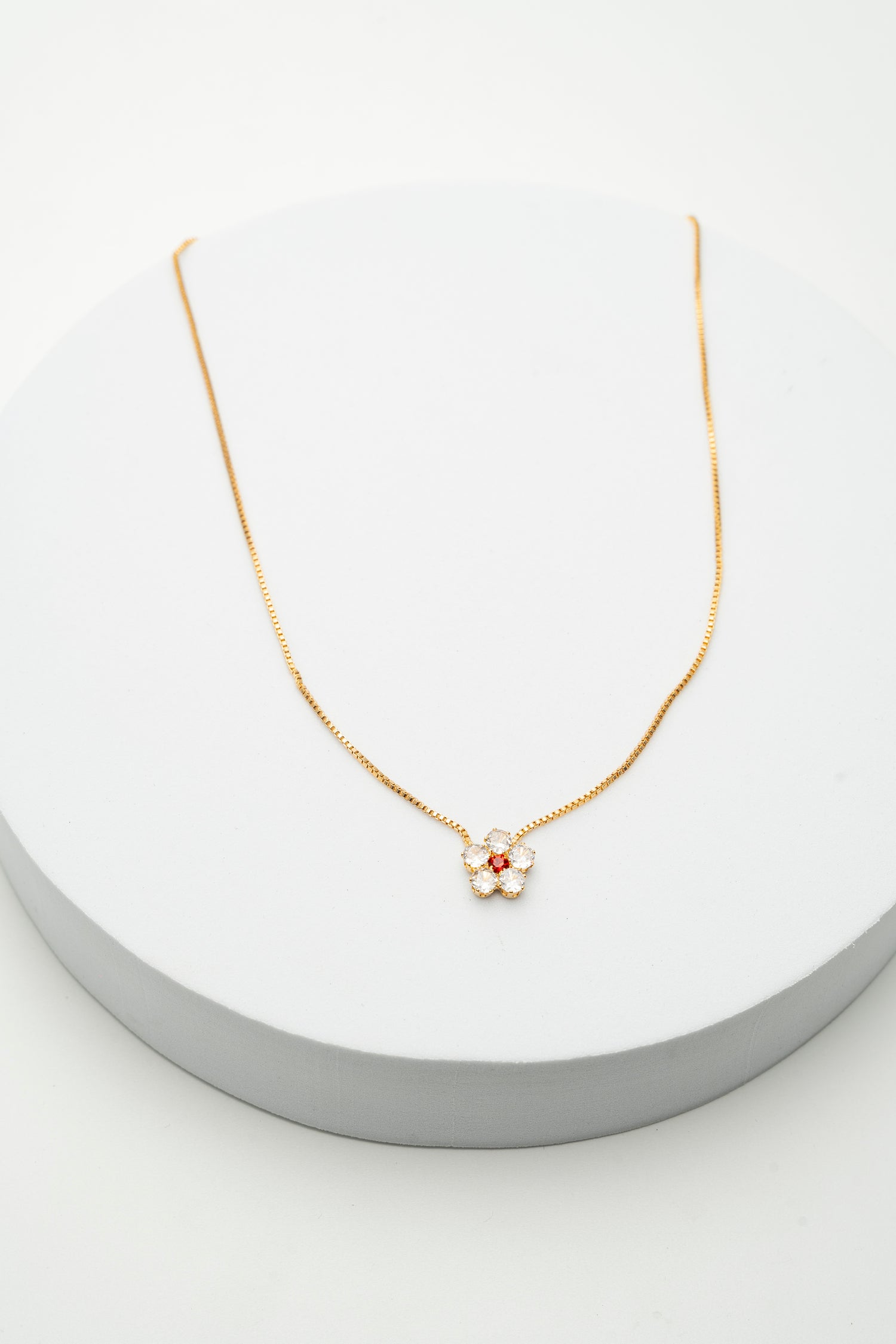 Collana Fiore Dorato con Zirconi e Punto Luce Rosso Red Bloom