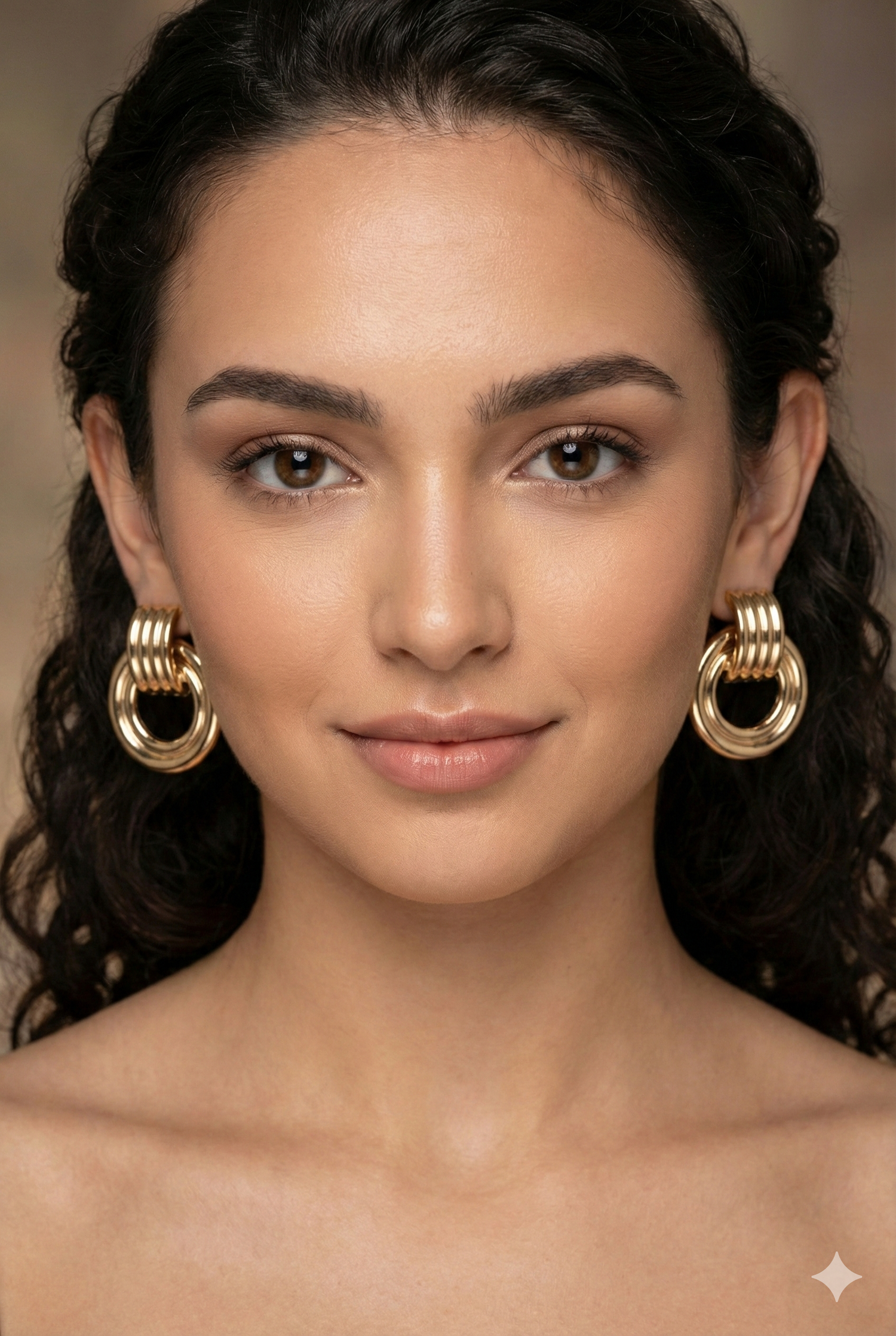 Orecchini Cerchi Dorati e Design Scultoreo Portofino